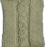 A cable swatch worked in the pattern of four stitches that lean to the right