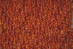 The Chevron rib stitch swatch worked in orange 