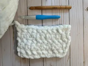 A swatch of Jumbo weight yarn on crochet hook