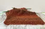 An example of the knit garter stitch worked with with homespun yarn