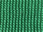 The knit sand stitch, right side knitted in a green, 100% cotton