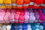 Assortment of skeins of yarn in a variety of colors
