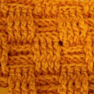 Basketweave crochet stitch worked in gold yarn
