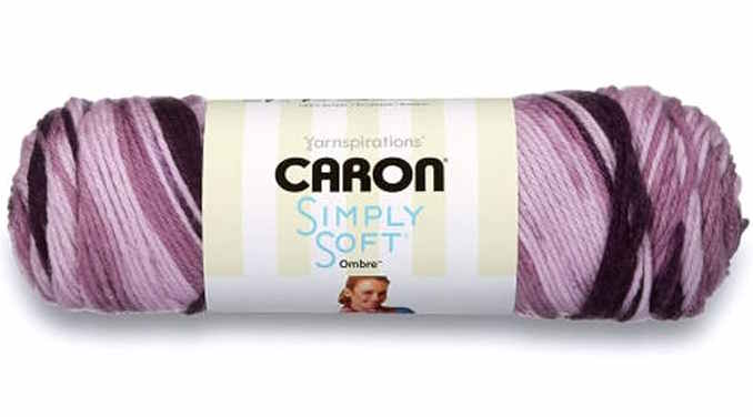 A skein of purple Caron Ombre yarn
