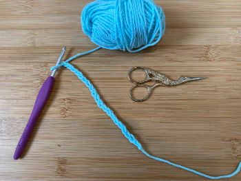Crochet V Stitch starts with a foundation chain of multiples of 3 plus 7.