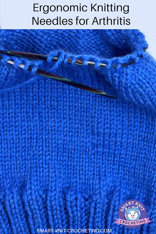A blue hat still on ergonomic circular knitting needles on a pin image