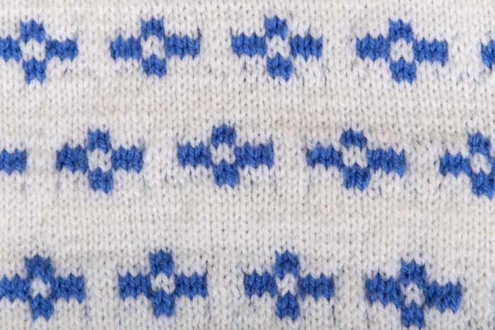 An example of a Fair Isle Knitting pattern in white and blue