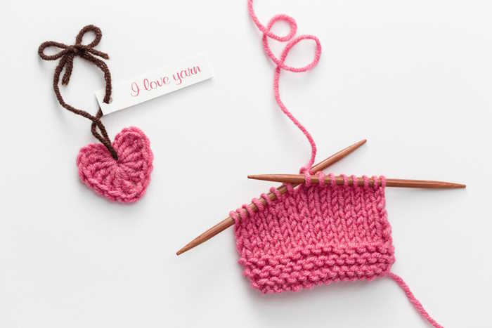Use knitting or crocheting to create a gift for a loved one