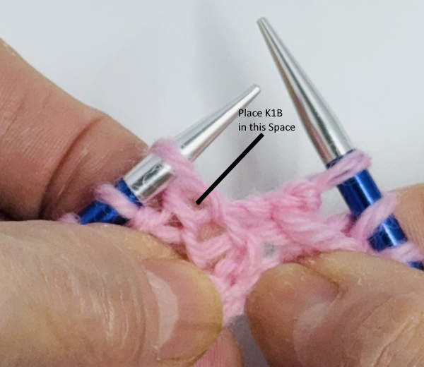 Demonstrating how to make the K1B technique in knitting Demonstrating how to make the K1B technique in knitting