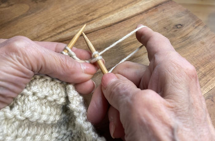 The last step of a step-by-step tutorial on how to do the KFB (knit front back)