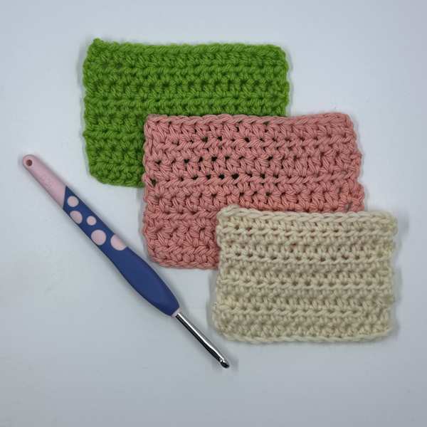 Knit Picks Dots Ergonomic Crochet Hook Shown with three swatches