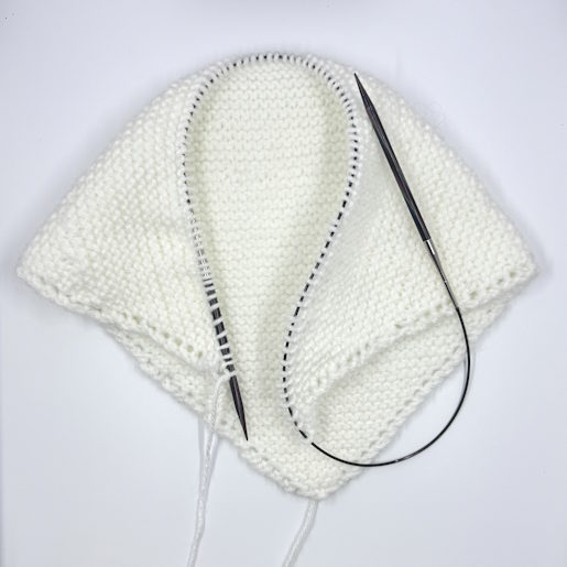 A white shawl on knit pick interchangeable needles