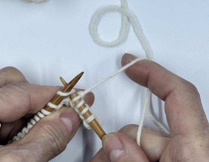 Step one of making the knit stitch, English style