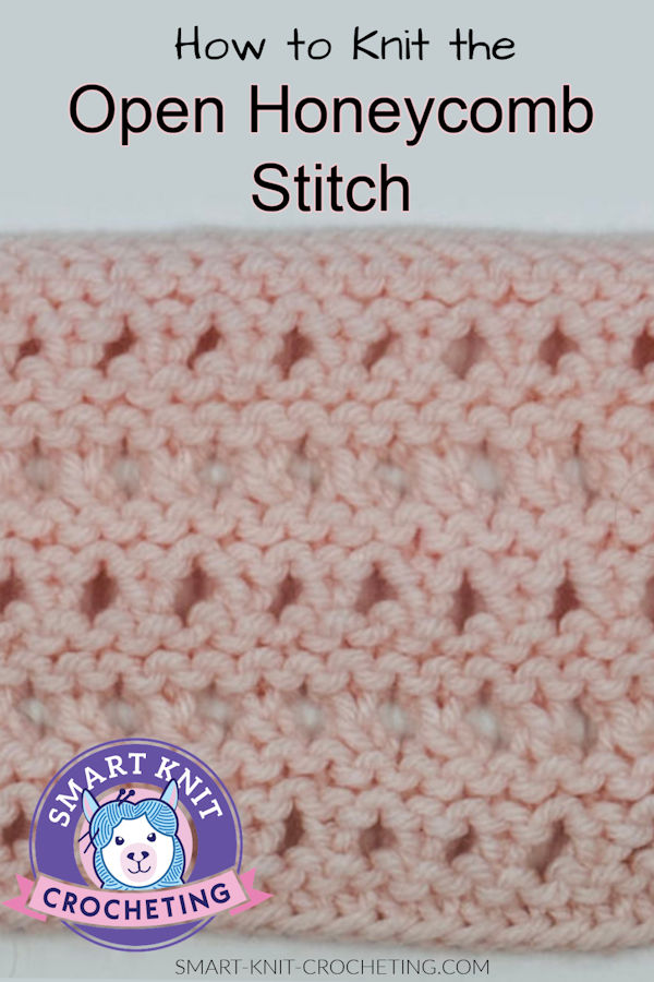 A swatch of the open honeycomb stitch worked in pink on a pin image