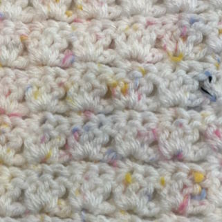 Parquet stitch worked in a white speckled yarn