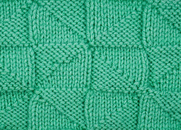 Right side showing of the pinwheel knit stitch pattern