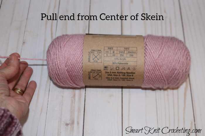 Find the end of the yarn which is often hidden in the center of the skein.