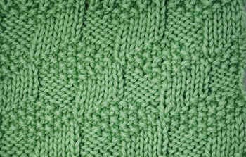 tumbling moss stitch pattern worked on a stitch multiple of 10 and a row repeat of 2o