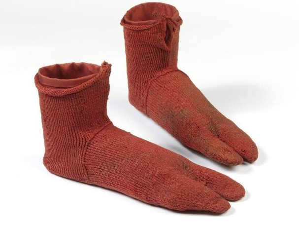 An ancient pair of socks thought to be knitting but actually nailbinding technique