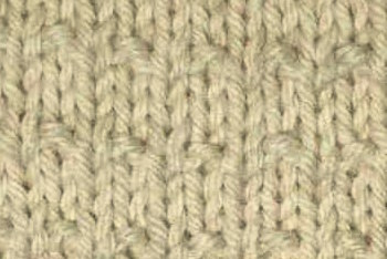 Andalusian knit stitch worked in white Andalusian knit stitch worked in white