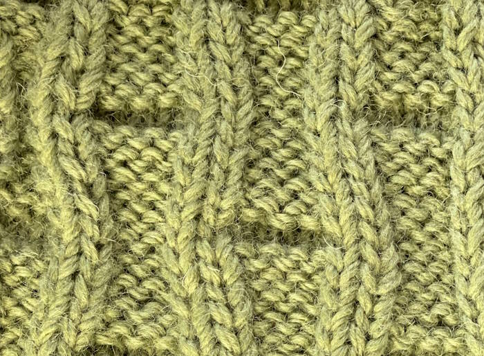 The wrong side showing of the bamboo rib knit stitch pattern