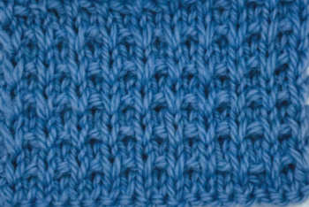 A thumbnail photo of the basket rib knit stitch worked in blue yarn