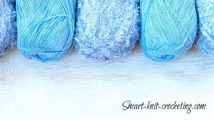 An assortment of blue yarn, color is one way to organize yarn at home An assortment of blue yarn, color is one way to organize yarn at home