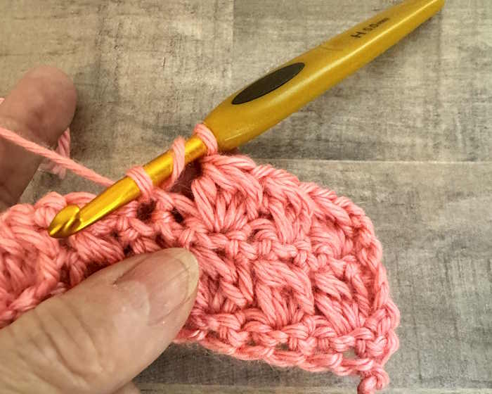 Step-by-step tutorial on how to crochet the bobble stitch.
