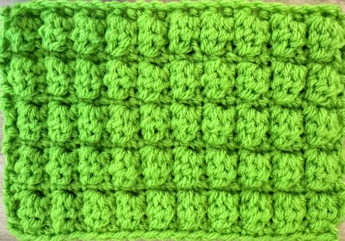 The right side is showing for the bobble stitch crochet swatch