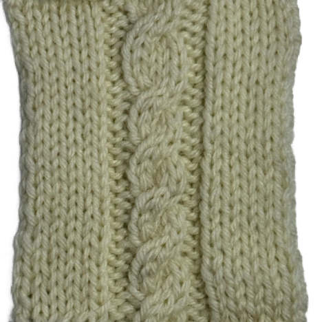 A cable swatch worked in the pattern of four stitches that lean to the right