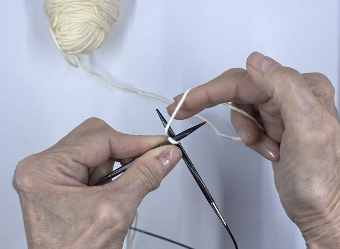 Work one stitch and place on the needle.