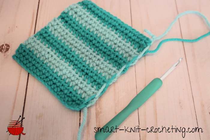 Color changes made in crochet by carrying the yarn tail up the side of the work.