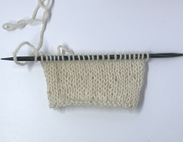 A gauge swatch for a circular knit project, front or right side.