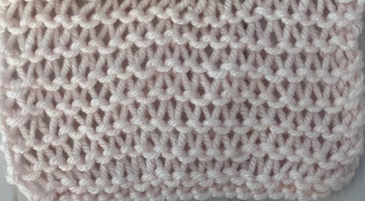 The knit condo stitch worked in pin yarn, close up