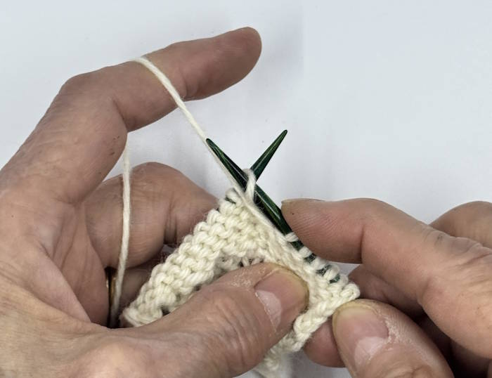 Step one of making the purl stitch continental style Step one of making the purl stitch continental style