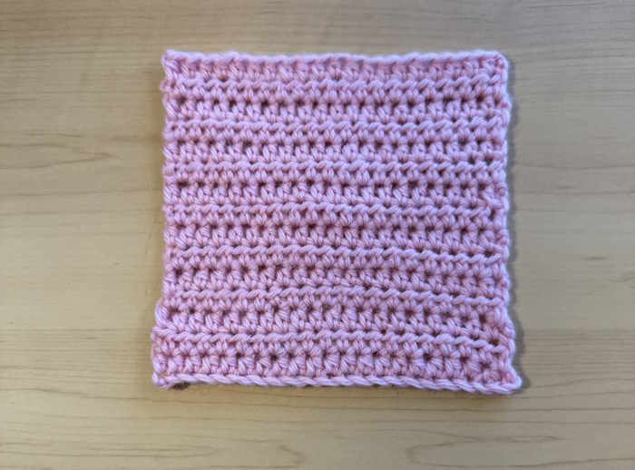 A crochet swatch worked entirely of half double crochet stitches A crochet swatch worked entirely of half double crochet stitches