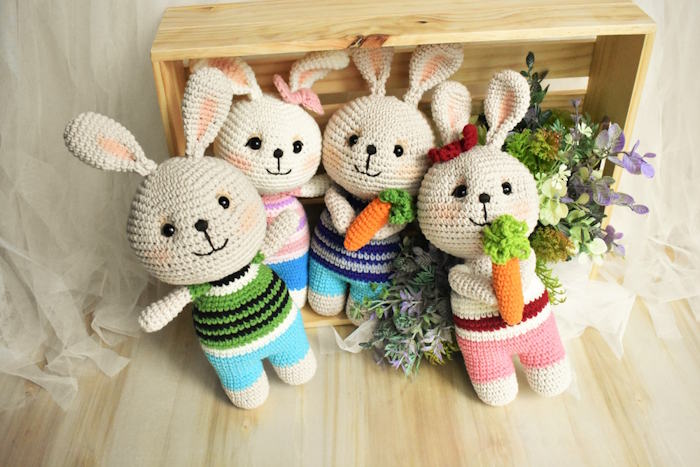 Four crochet rabbit toys