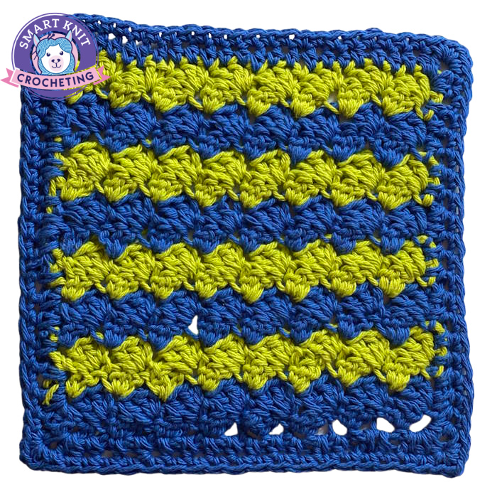 Crochet blanket stitch used to create a dishcloth in two colors.