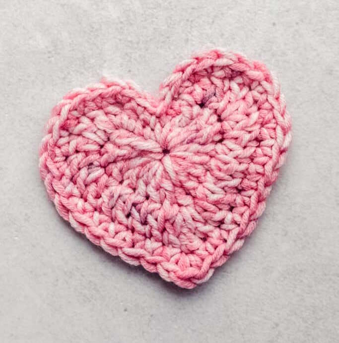 crochet heart pattern worked in pink yarn crochet heart pattern worked in pink yarn