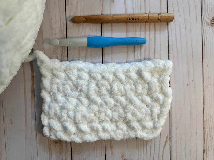 A swatch of Jumbo weight yarn on crochet hook