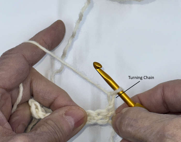 Creating the turning chain to start the second row of crochet stitches