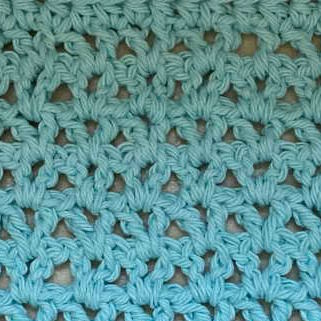 Crochet v stitch worked in teal cotton yarn