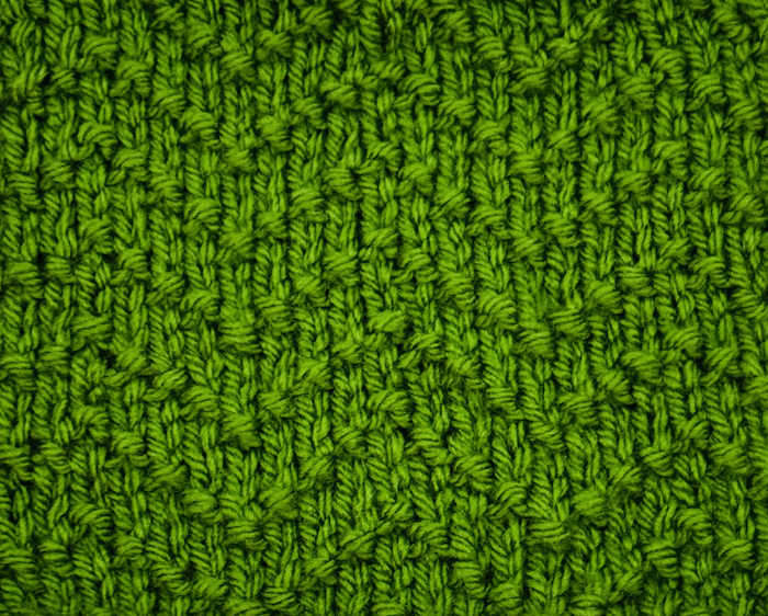 Another version of the seed stitch chevron stitch pattern worked in green