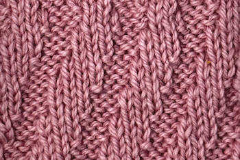 Thumbnail image of the Diagonal spiral rib stitch worked in pink 
