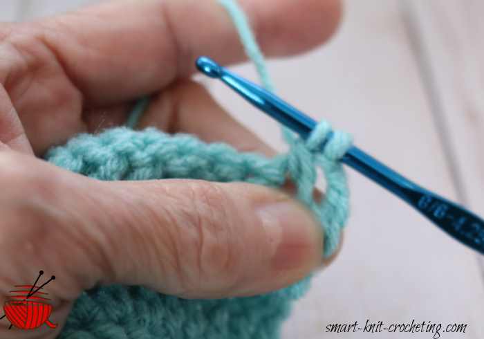 Yarn over, pull through two loops.