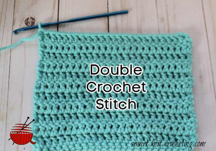 A swatch of teal-colored fabric done in the double crochet stitch.