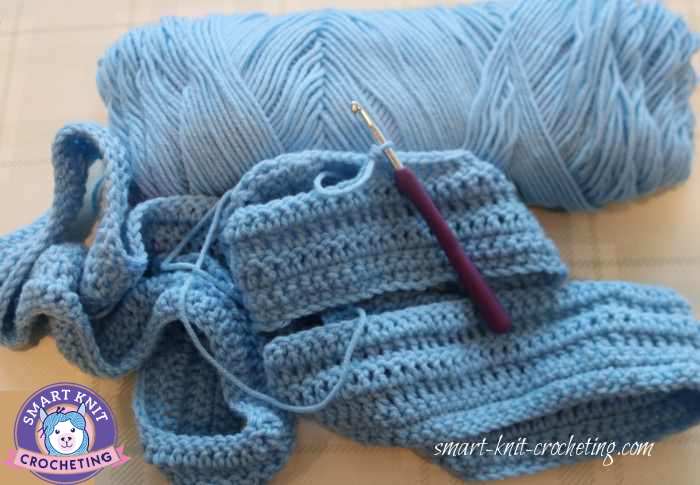 Blue yarn and sample of double crochet stitch