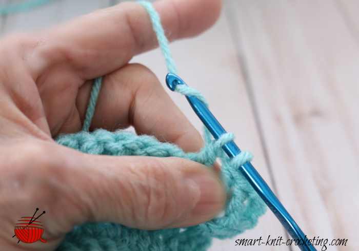 Yarn over again and pull through the remaining two loops.