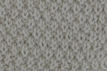 Moss stitch worked in white