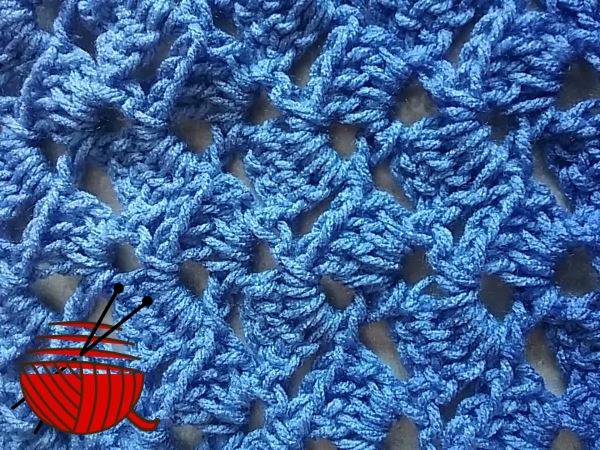 Drunken granny stitch worked in blue yarn Drunken granny stitch worked in blue yarn